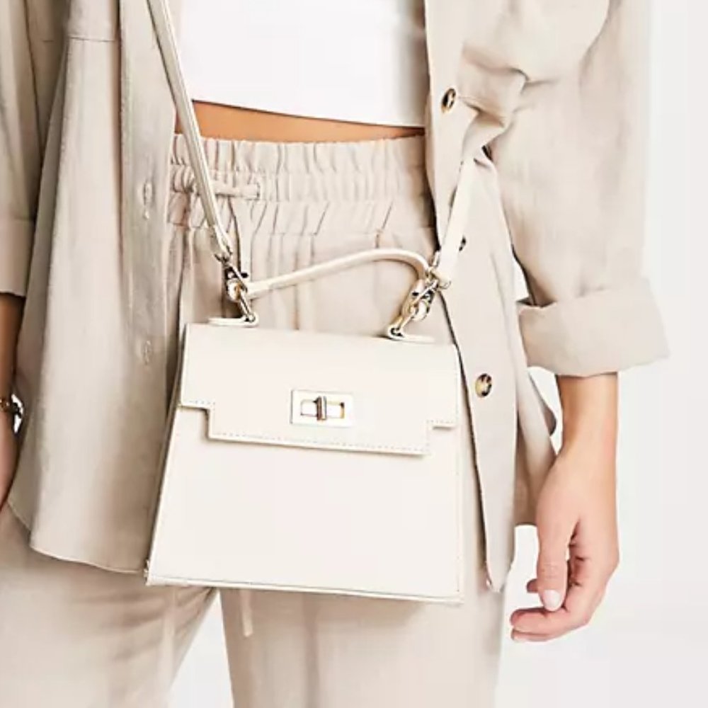 ASOS DESIGN lock detail bag with top handle and detachable crossbody strap